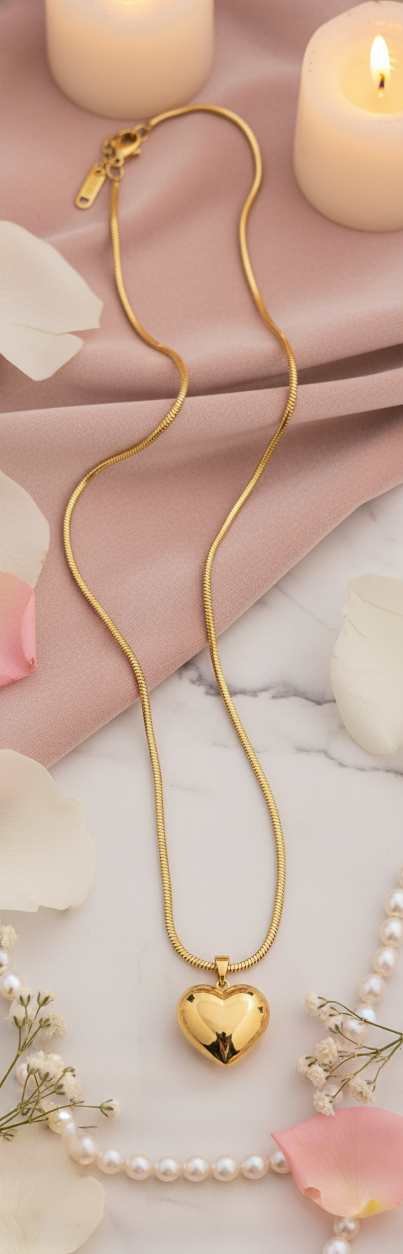 Gold-plated snake chain heart necklace in luxurious setting