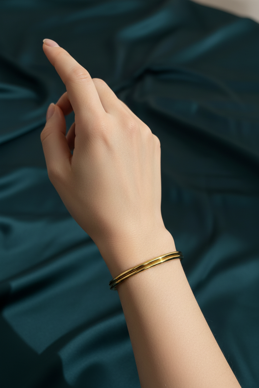 Gold-Tone Bangle on Model Hand