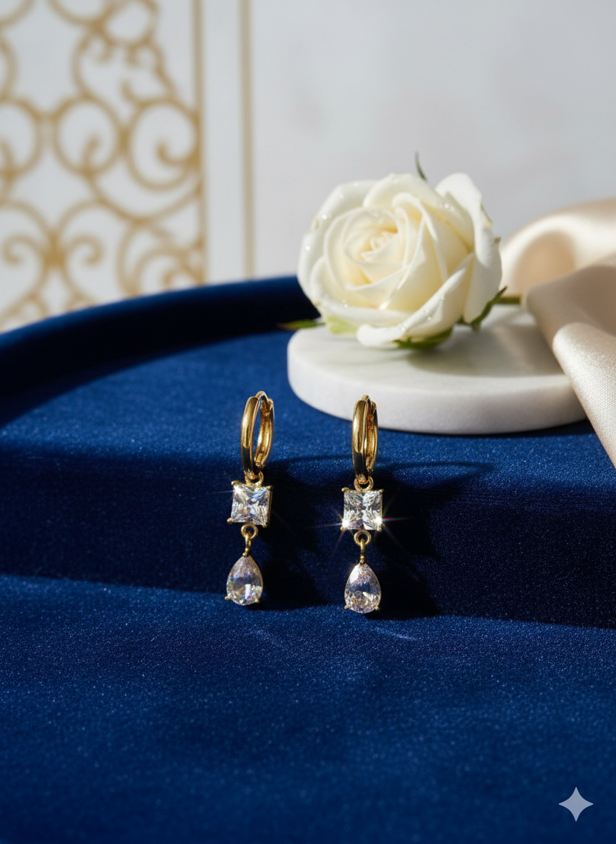 The Stellar Drop Earrings in Luxurious Setting